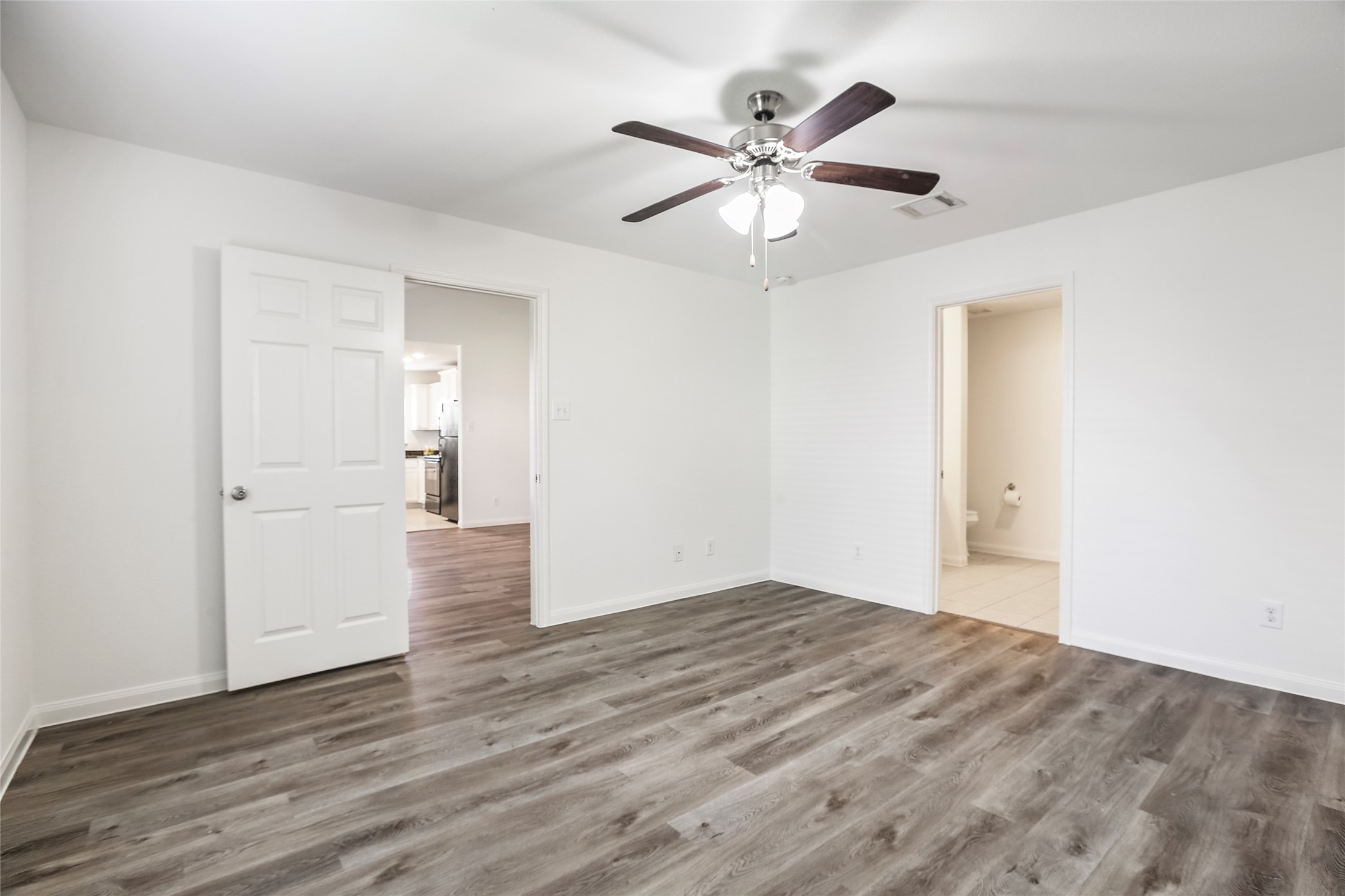 100 Robertson Lane Jarrell, TX 76537 - Photo 12 of 29 Primary with views into the primary bathroom