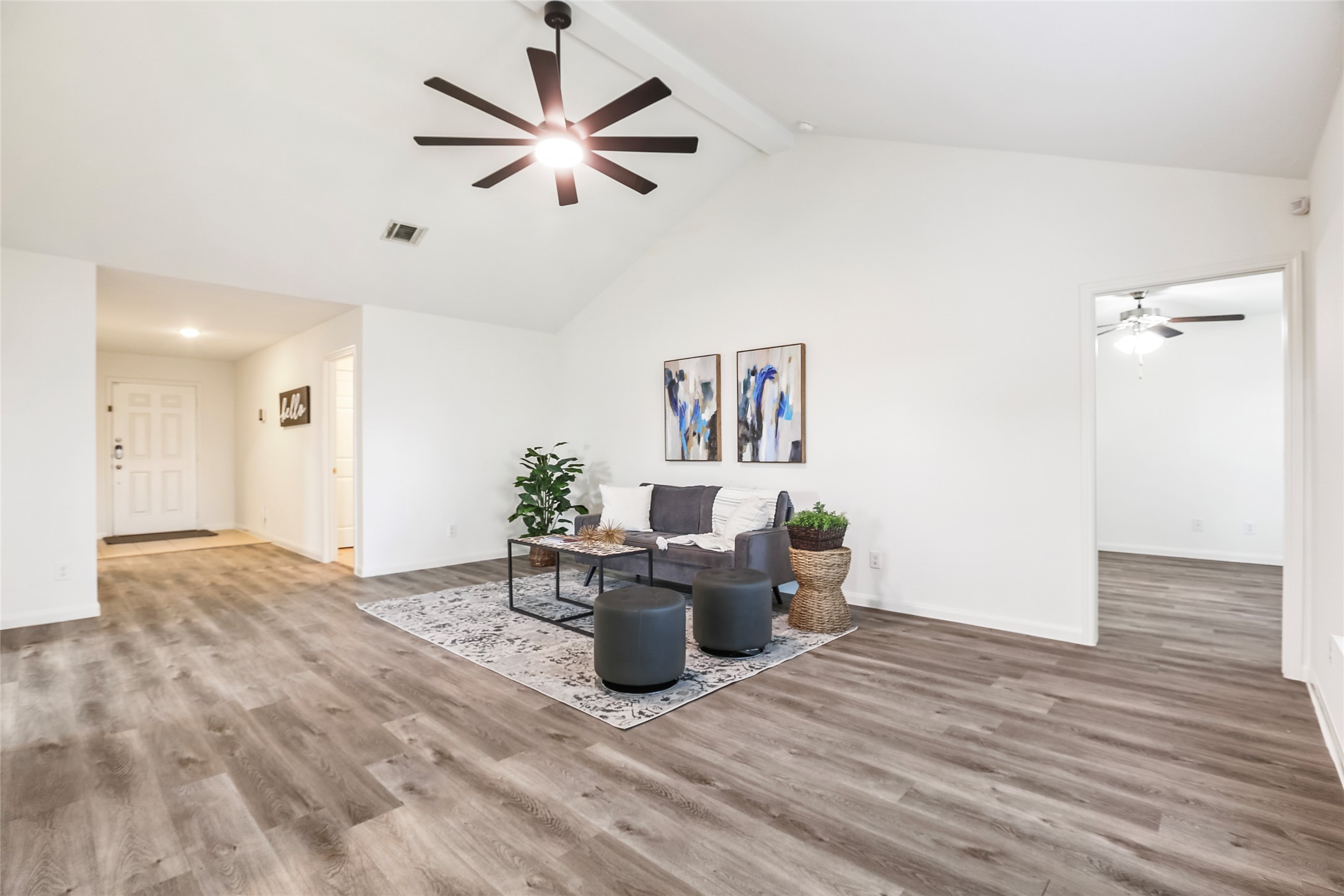 100 Robertson Lane Jarrell, TX 76537 - Photo 4 of 29 View of Family room looking into the entry foyer