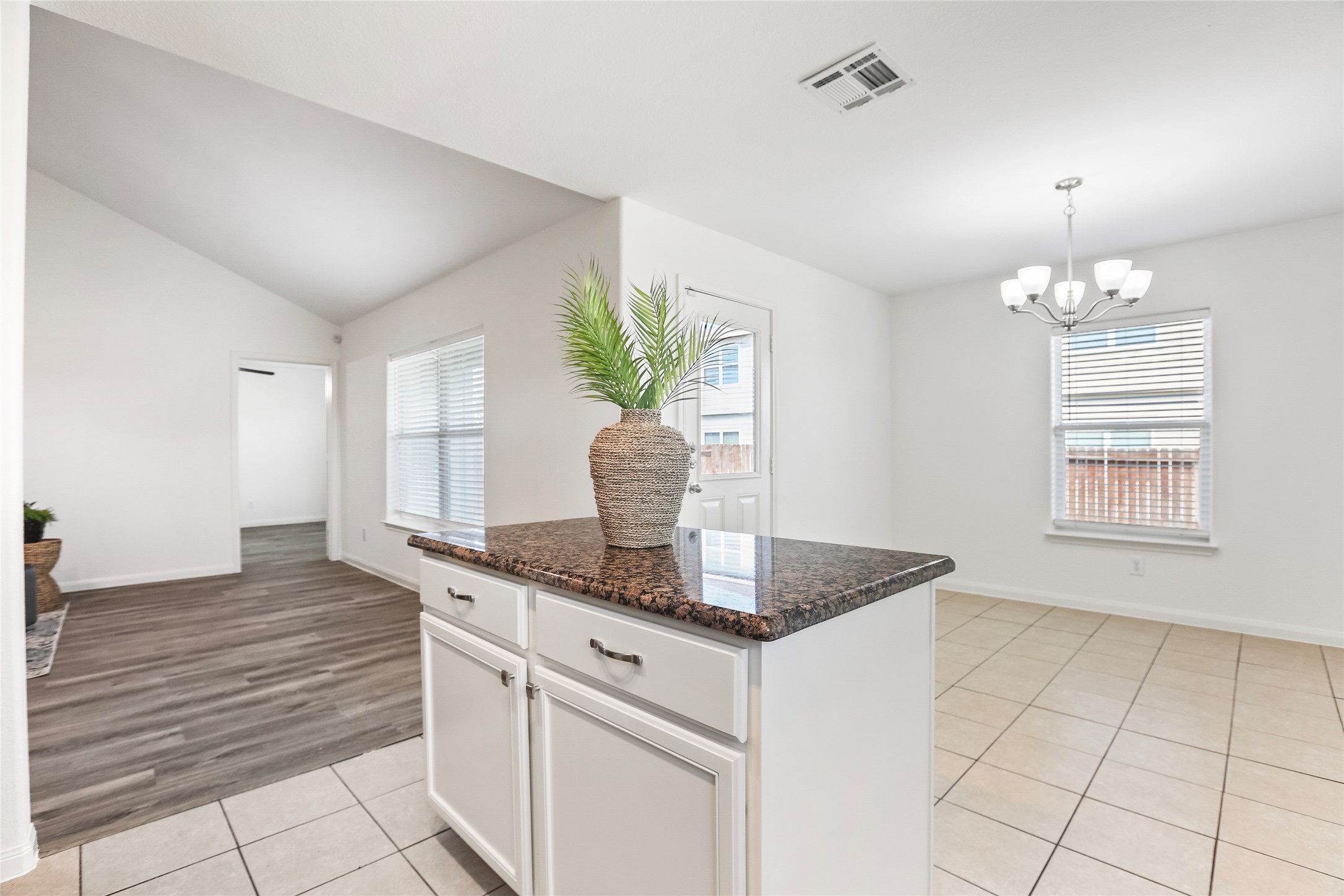 100 Robertson Lane Jarrell, TX 76537 - Photo 9 of 29 Kitchen looking into the dining space