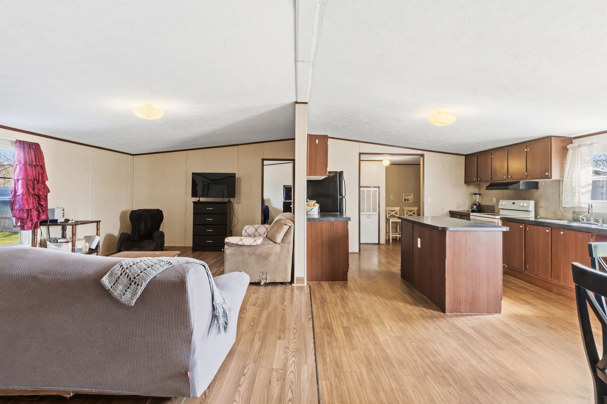 3412 Huffman-Eastgate Road Huffman, TX 77336 - Photo 17 of 43 a living room with furniture and a flat screen tv
