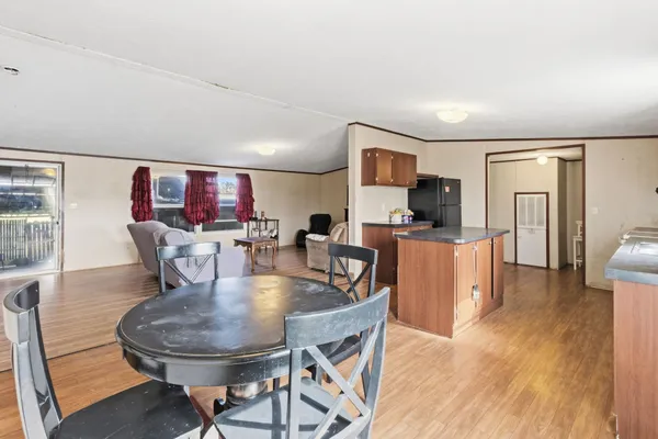 a kitchen with cabinets a sink and appliances