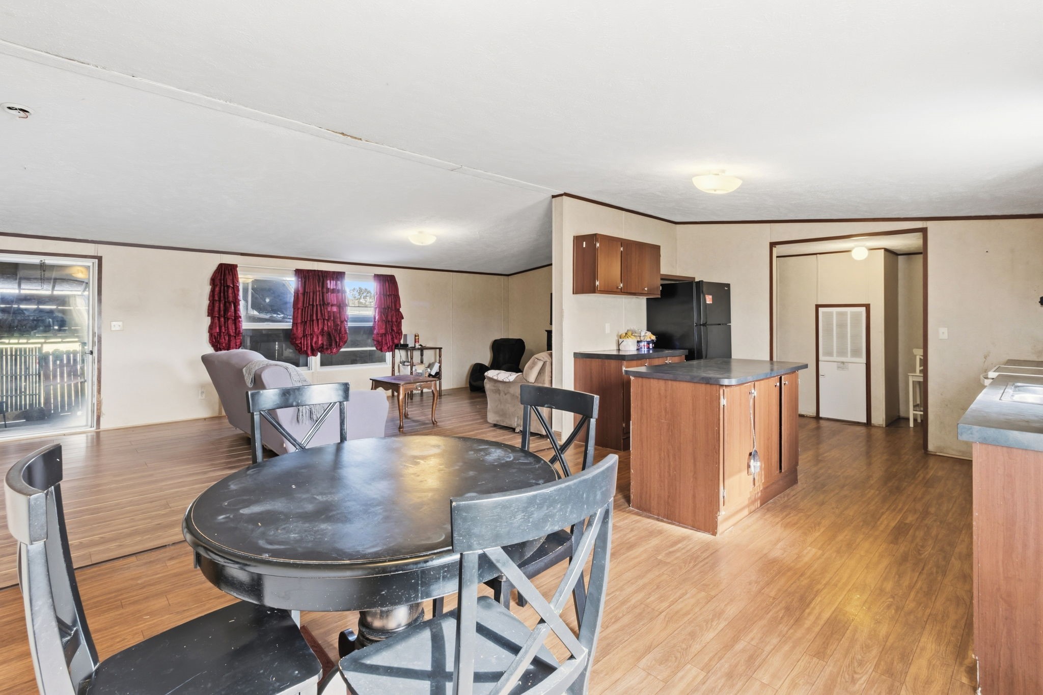 3412 Huffman-Eastgate Road Huffman, TX 77336 - Photo 20 of 43 a dining room with furniture and wooden floor