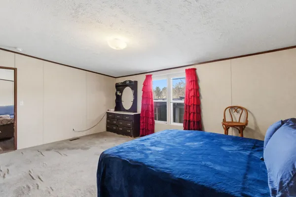 a view of a room with wooden roof