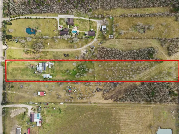 a view of a swimming pool and lounge chair