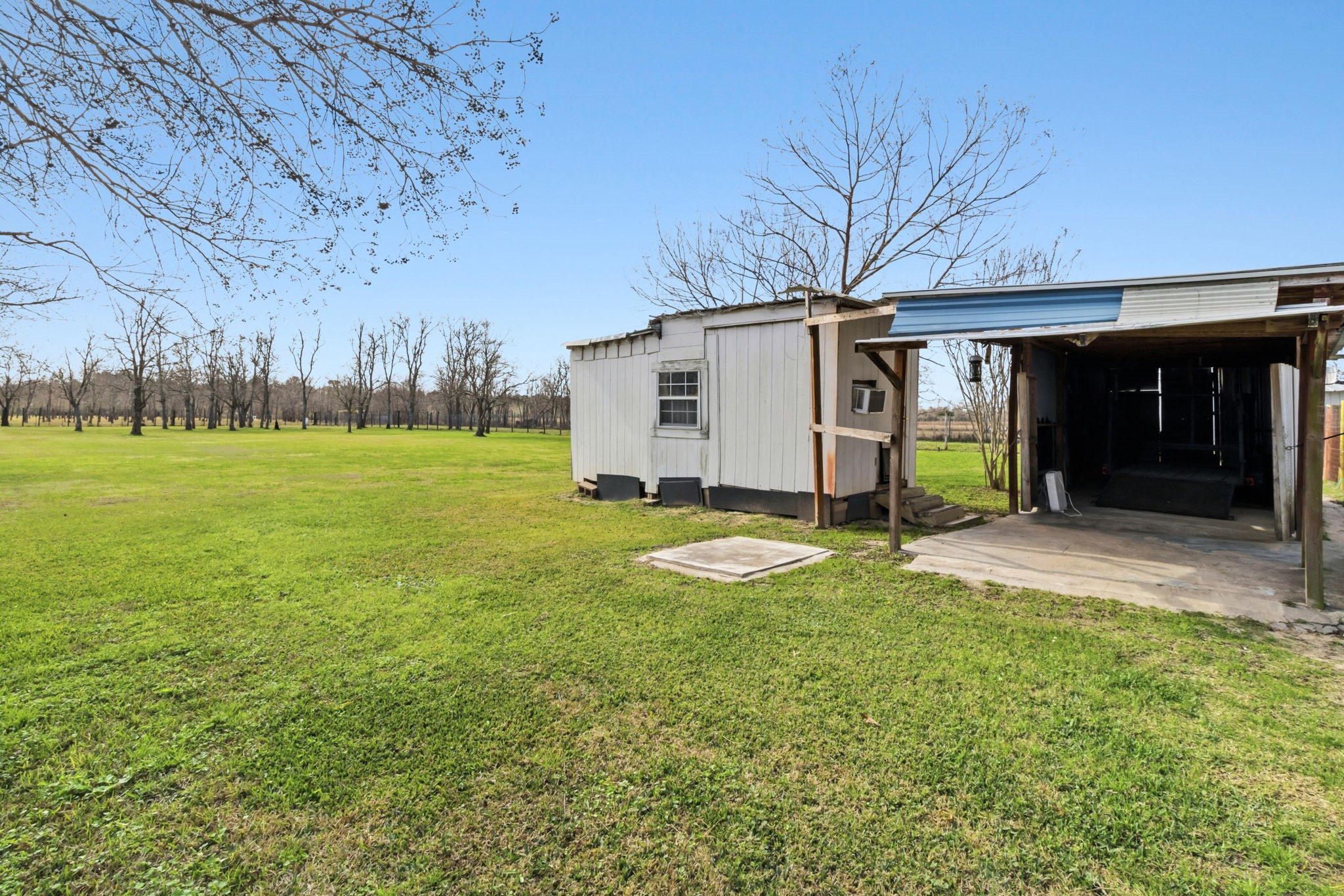 3412 Huffman-Eastgate Road Huffman, TX 77336 - Photo 36 of 43 a view of a house with backyard and garden
