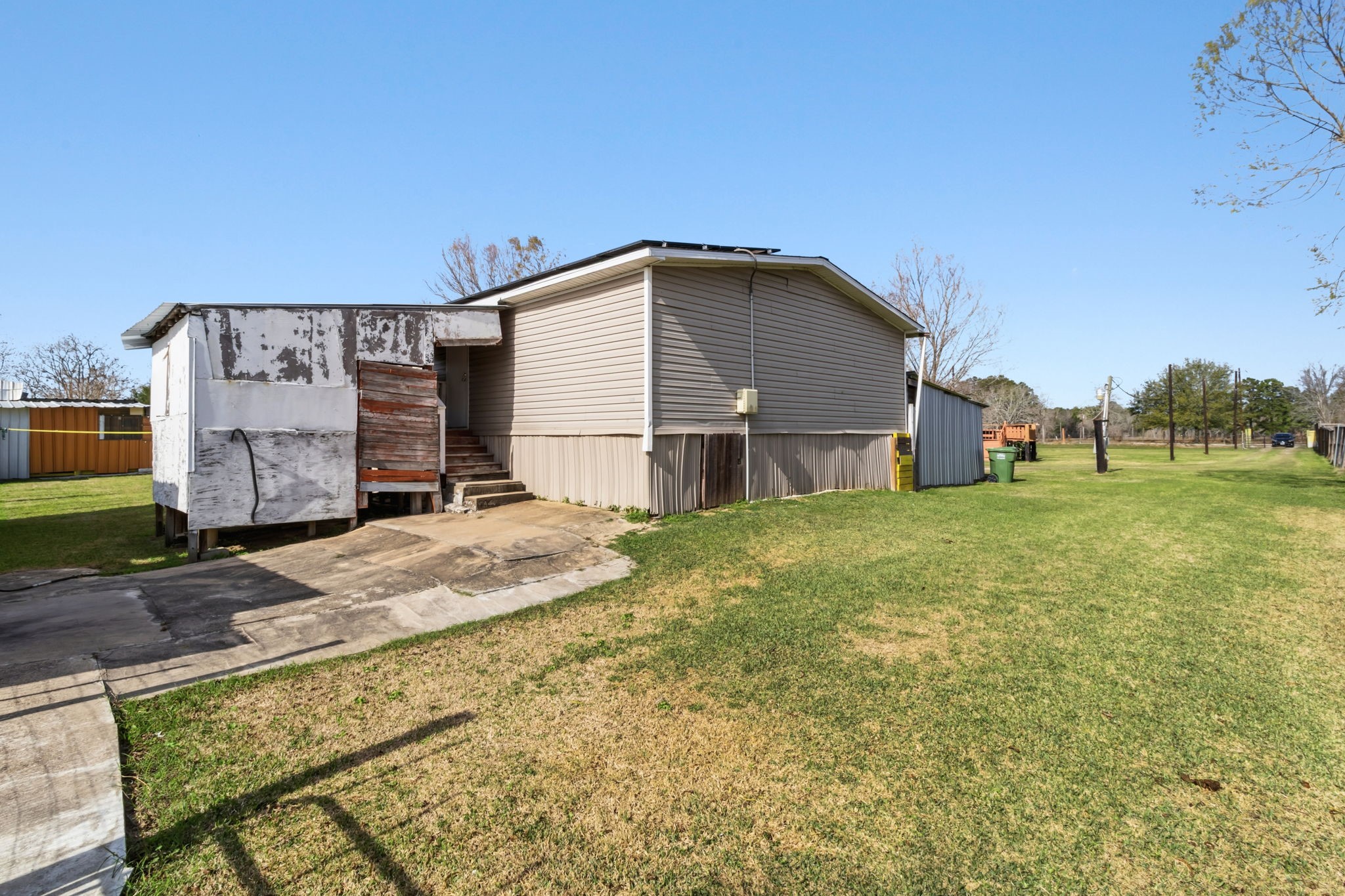 3412 Huffman-Eastgate Road Huffman, TX 77336 - Photo 37 of 43 a view of a house with a backyard