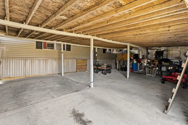 a living room with a couch and a flat screen tv