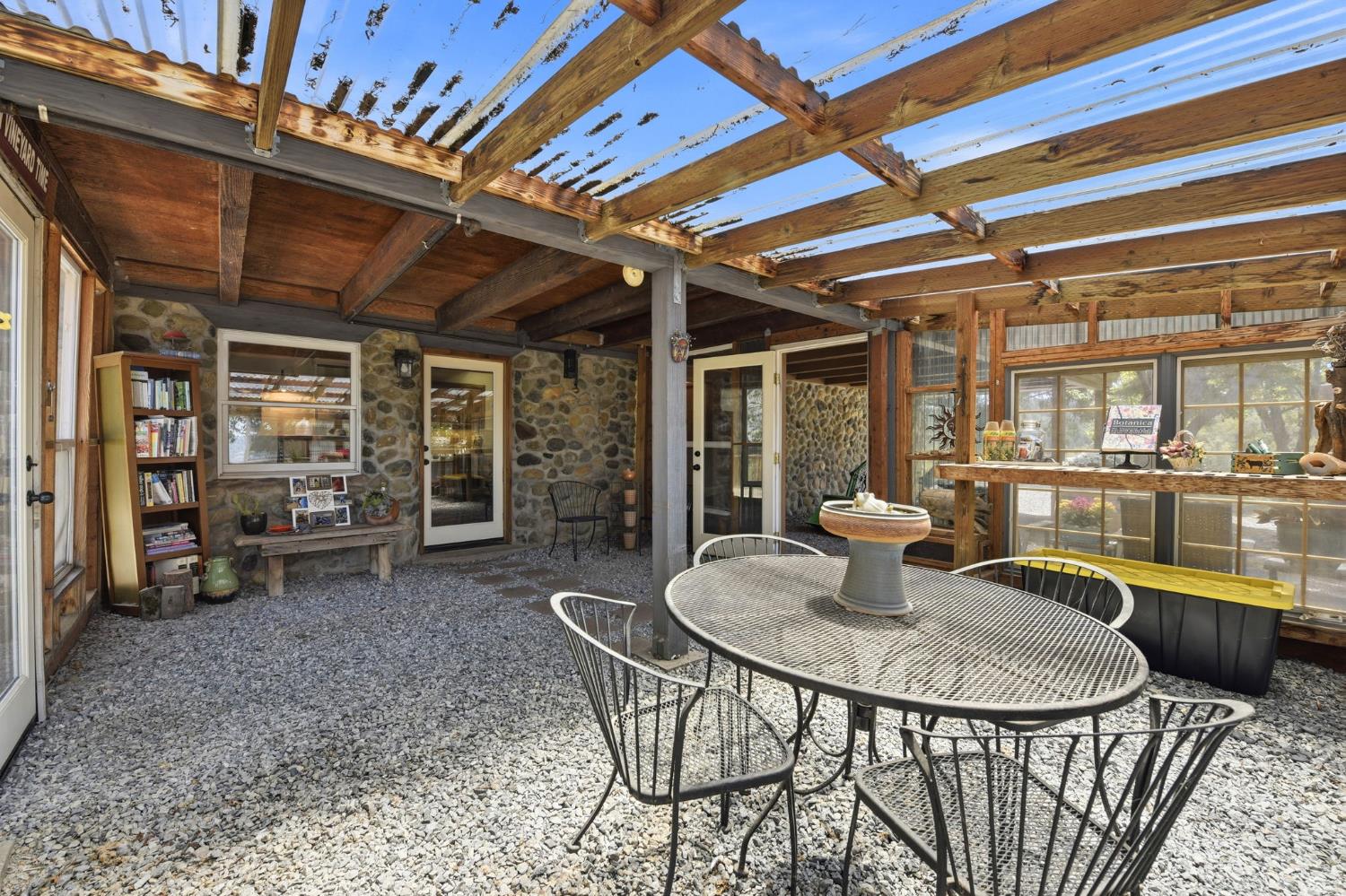 7201 Happy Valley Road Somerset, CA 95684 - Photo 47 of 75 Enjoy warm climates year round in the solarium like fully enclosed sunroom.This room acts like a solarium to keep the guest cottage warm in the winter.