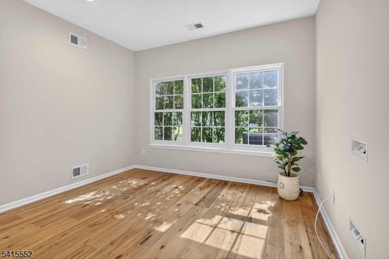 33 Four Oaks Road Bedminster, NJ 07921 - Photo 14 of 29 a view of an empty room with a window