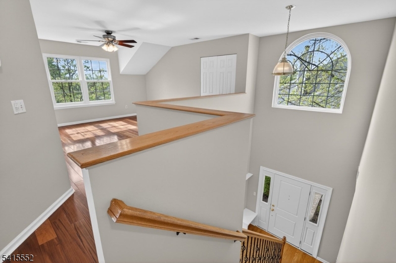 33 Four Oaks Road Bedminster, NJ 07921 - Photo 18 of 29 a view of room with window and wooden floor