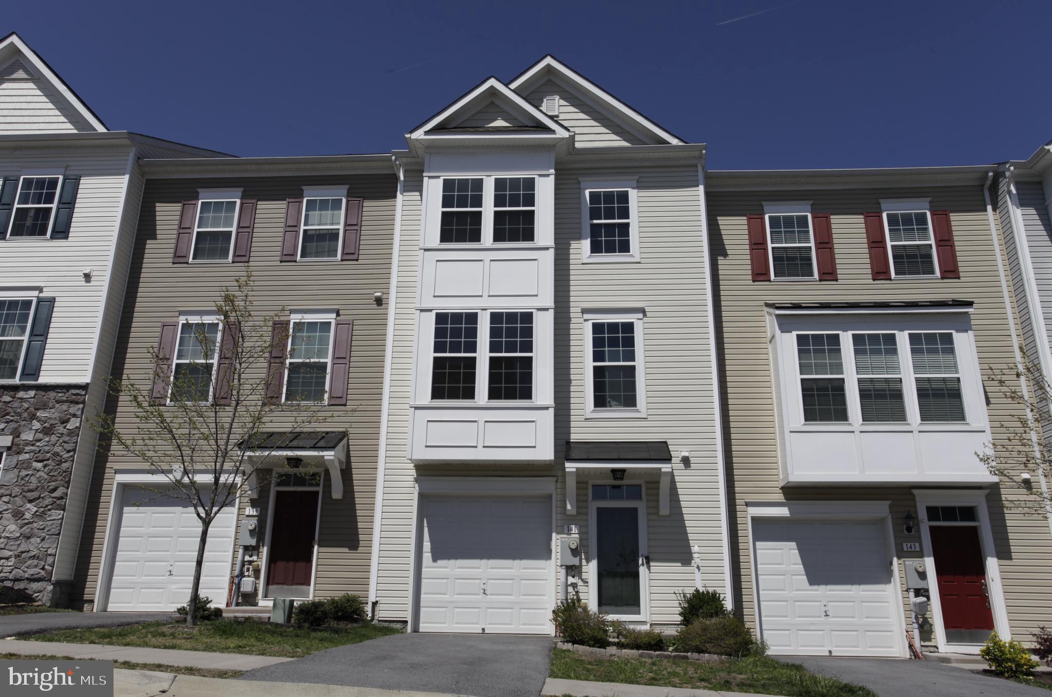 3 Level Contemporary Townhome in Townes of Tasker