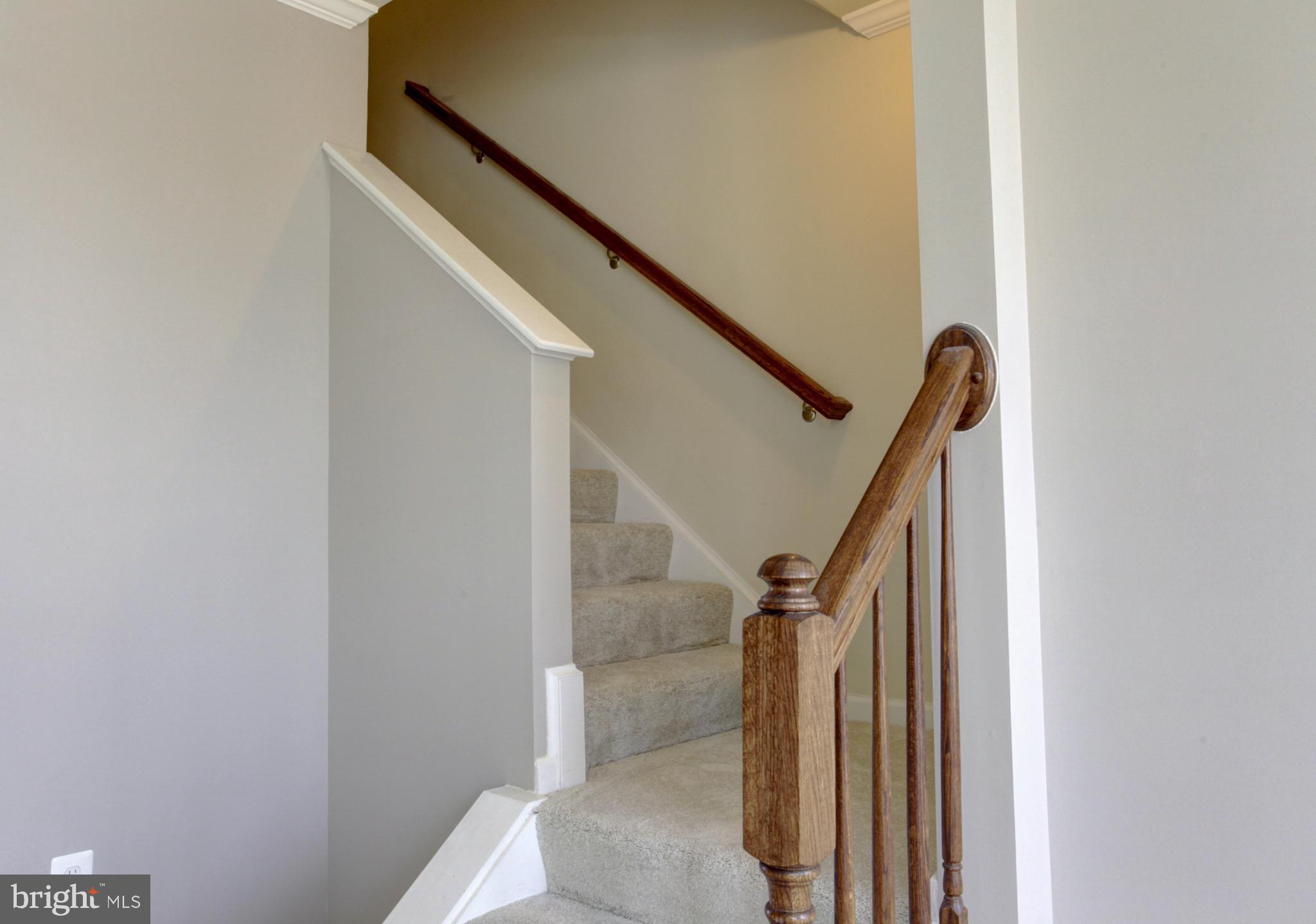 141 Schramm Loop Stephens City, VA 22655 - Photo 3 of 40 Pretty Turned Stair to the Upper Floors