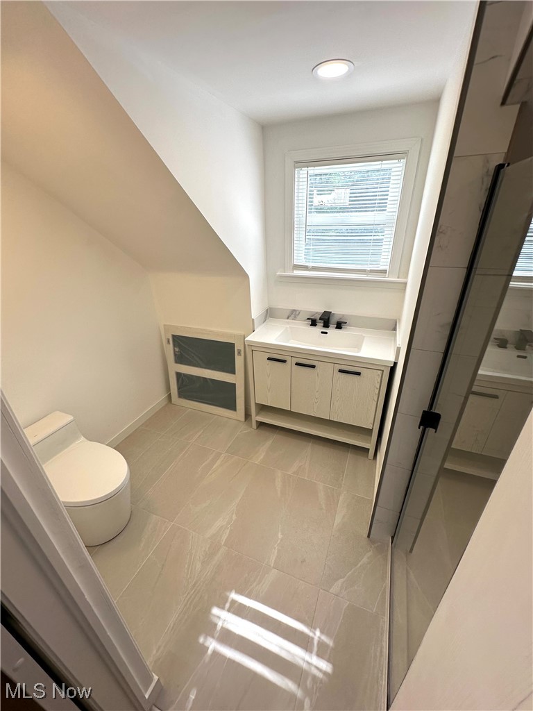 568 North Road Southeast Warren, OH 44484 - Photo 38 of 49 Bathroom featuring toilet and vanity