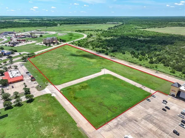 a view of a golf course with a building