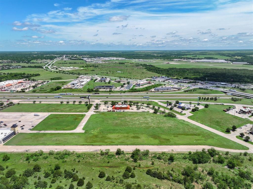 0 Tanger Drive Terrell, TX 75160 - Photo 10 of 26 a view of a golf course with a building