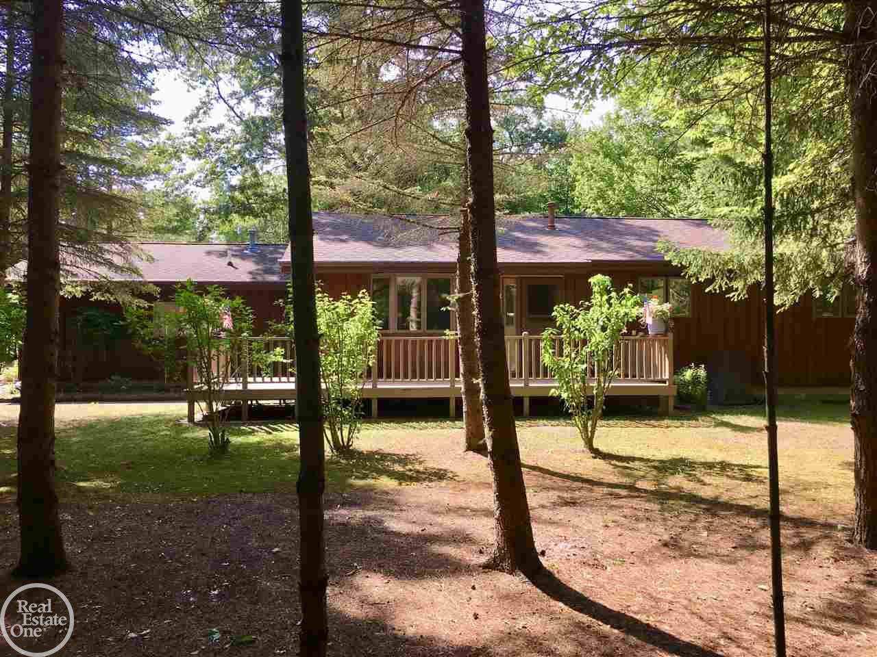 6044 Port Austin Road Caseville, MI 48725 - Photo 2 of 47 Nestled in the woods