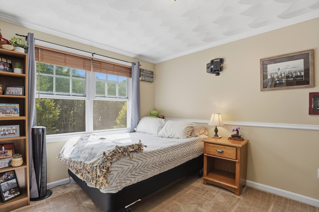 160 Gray Road Templeton, MA 01468 - Photo 22 of 42 a bedroom with a bed and a window