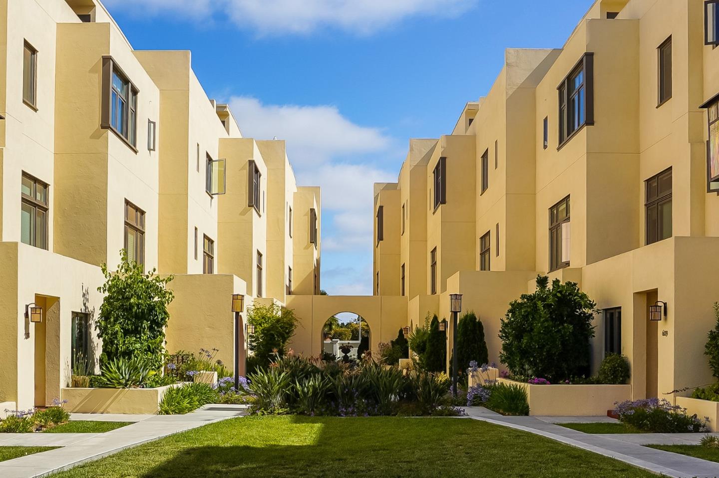 a view of a building with a yard