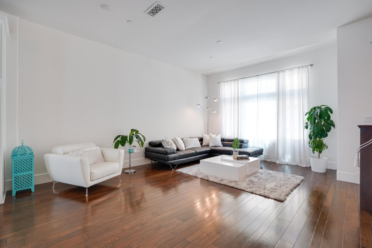 536 Fierro Loop Campbell, CA 95008 - Photo 13 of 57 a living room with furniture and wooden floor