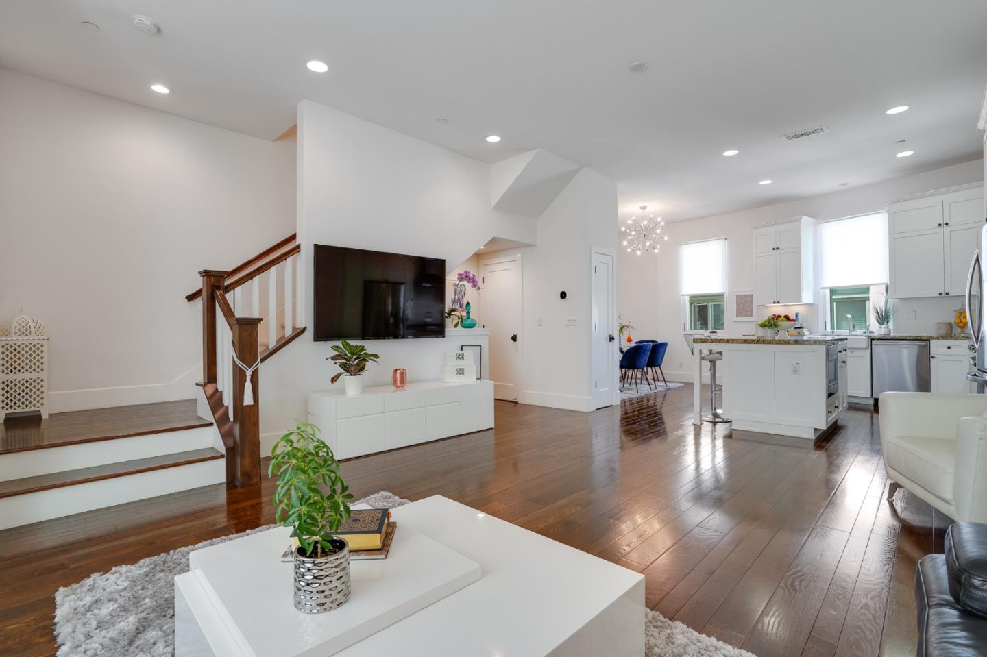 536 Fierro Loop Campbell, CA 95008 - Photo 14 of 57 a living room with stainless steel appliances furniture wooden floor and a view of kitchen