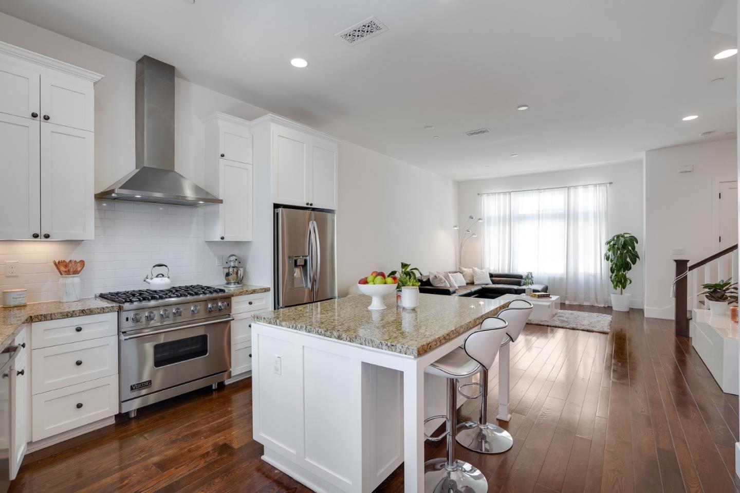 536 Fierro Loop Campbell, CA 95008 - Photo 19 of 57 a kitchen with sink stove and cabinets