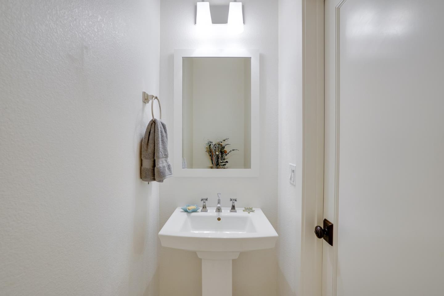 536 Fierro Loop Campbell, CA 95008 - Photo 25 of 57 a bathroom with a sink and a mirror