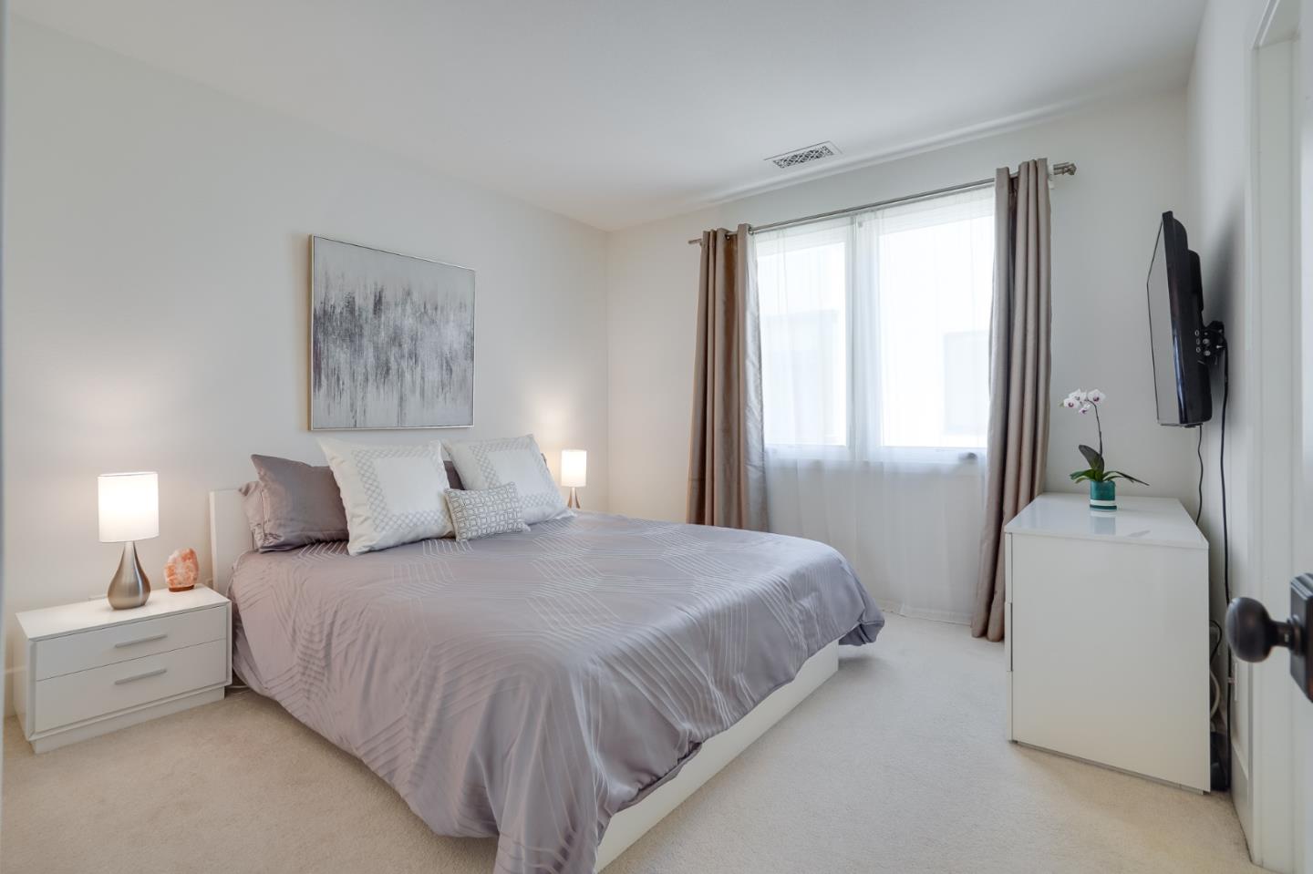 536 Fierro Loop Campbell, CA 95008 - Photo 26 of 57 a bedroom with a bed and a television