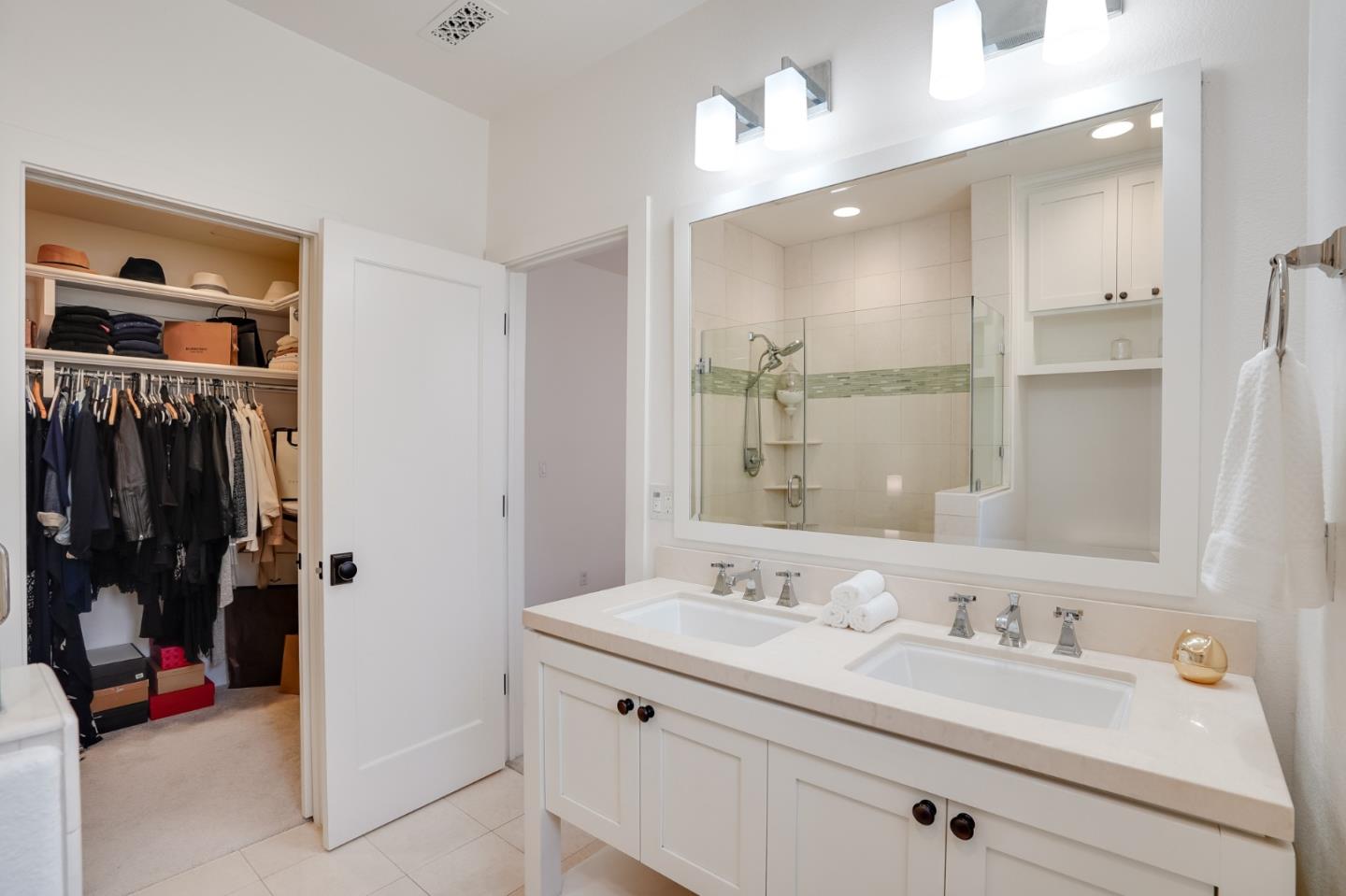 536 Fierro Loop Campbell, CA 95008 - Photo 30 of 57 a bathroom with a double vanity sink and a mirror