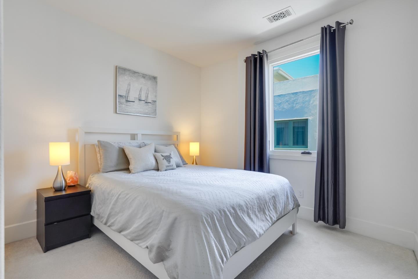 536 Fierro Loop Campbell, CA 95008 - Photo 33 of 57 a bedroom with a bed and a mirror