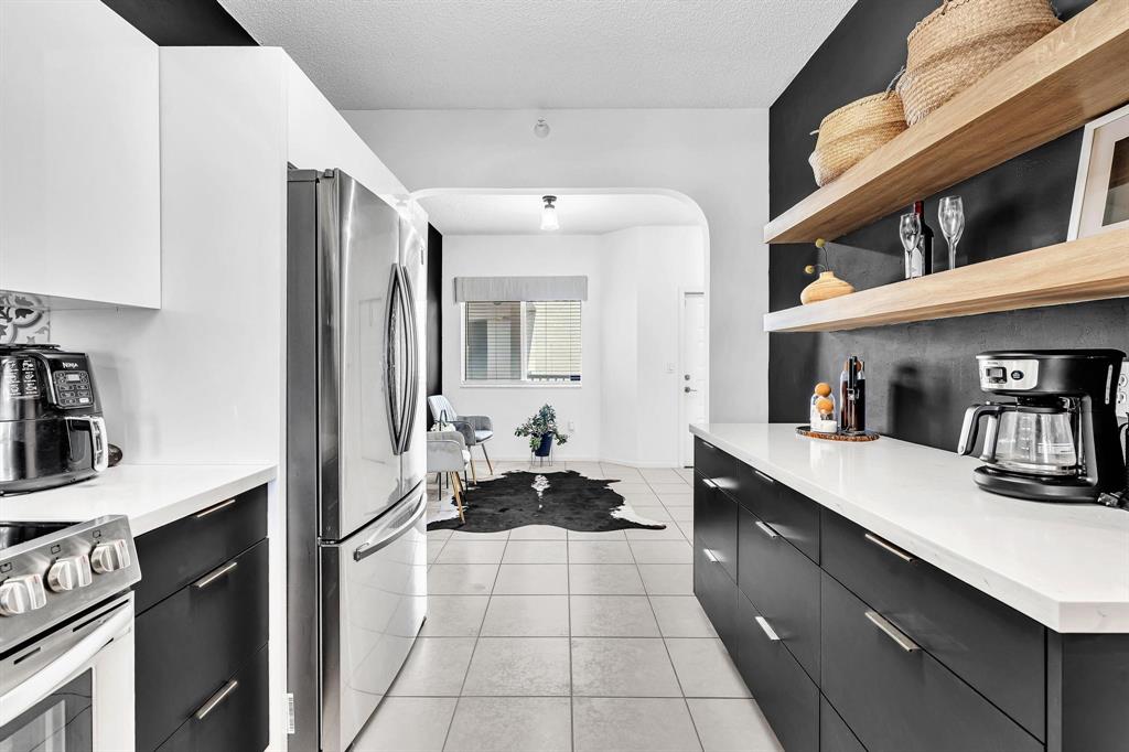 7775 Southampton Terrace, Unit 405 Tamarac, FL 33321 - Photo 12 of 82 a lobby with a couch and a view of living room