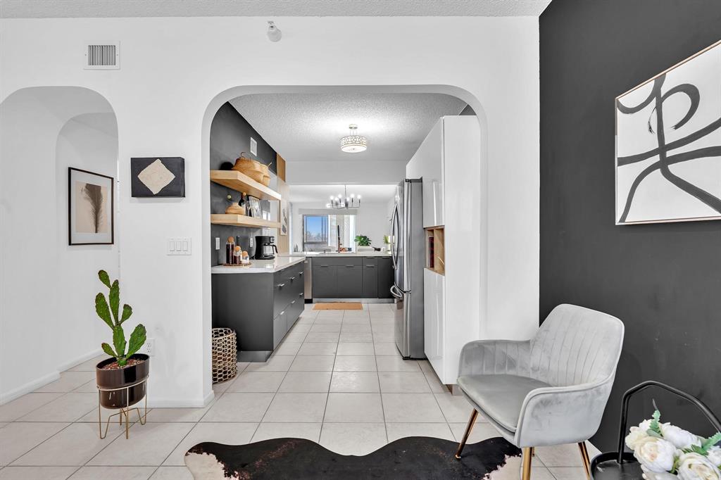 7775 Southampton Terrace, Unit 405 Tamarac, FL 33321 - Photo 13 of 82 a living room with furniture and a potted plant