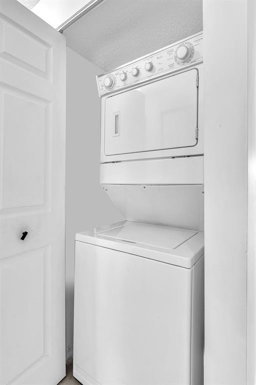 7775 Southampton Terrace, Unit 405 Tamarac, FL 33321 - Photo 43 of 82 a utility room with dryer and washer