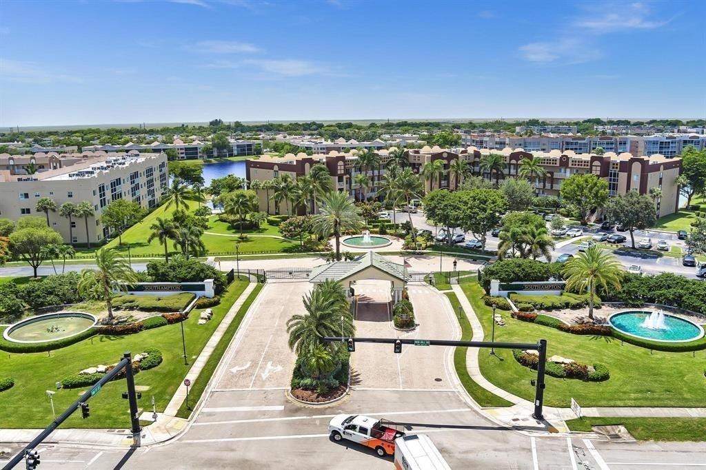 7775 Southampton Terrace, Unit 405 Tamarac, FL 33321 - Photo 58 of 82 a view of a swimming pool with outdoor seating and city view
