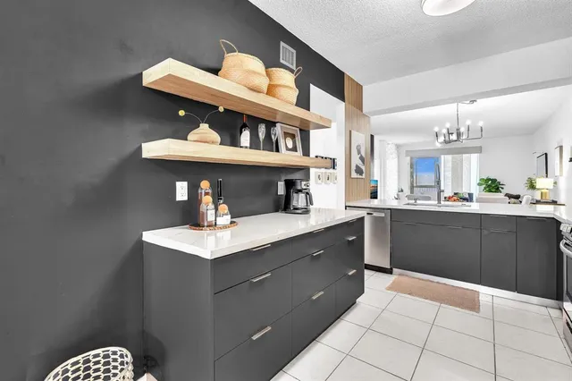a lobby with a couch and a view of living room