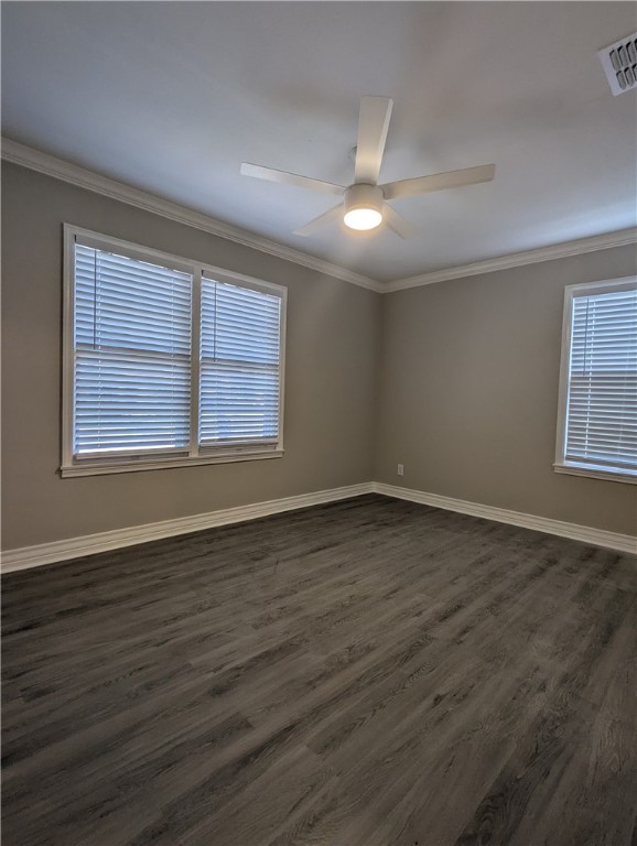 805 Anderson Street Corpus Christi, TX 78411 - Photo 11 of 15 an empty room with wooden floor and windows
