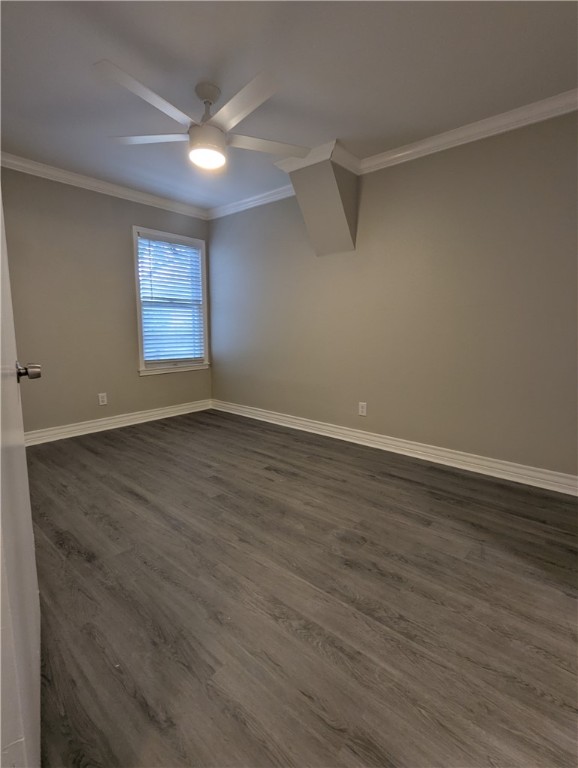805 Anderson Street Corpus Christi, TX 78411 - Photo 12 of 15 an empty room with wooden floor and windows