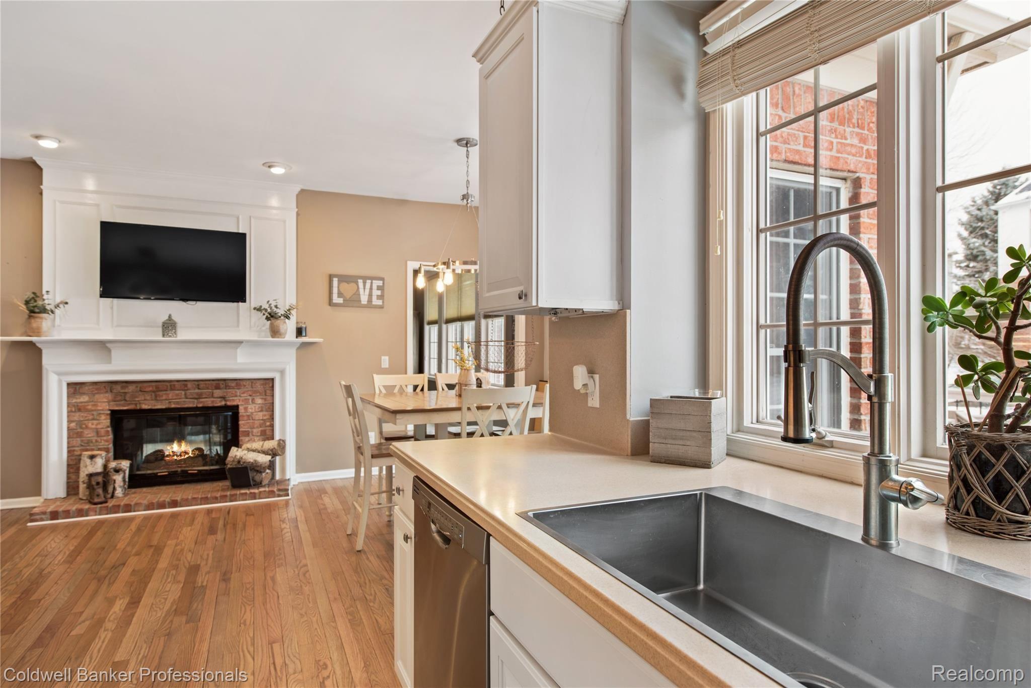 fireplace faces kitchen and great room 