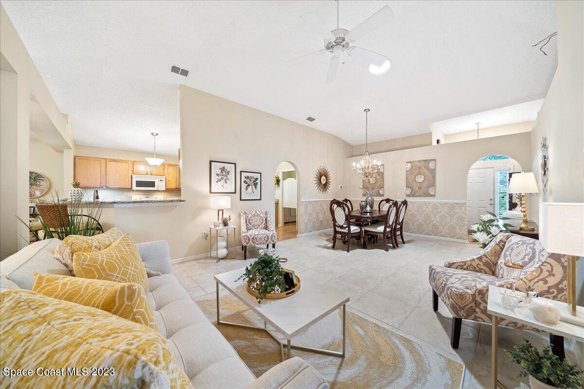 2190 Spring Creek Circle Palm Bay, FL 32905 - Photo 14 of 73 Living & Dining room