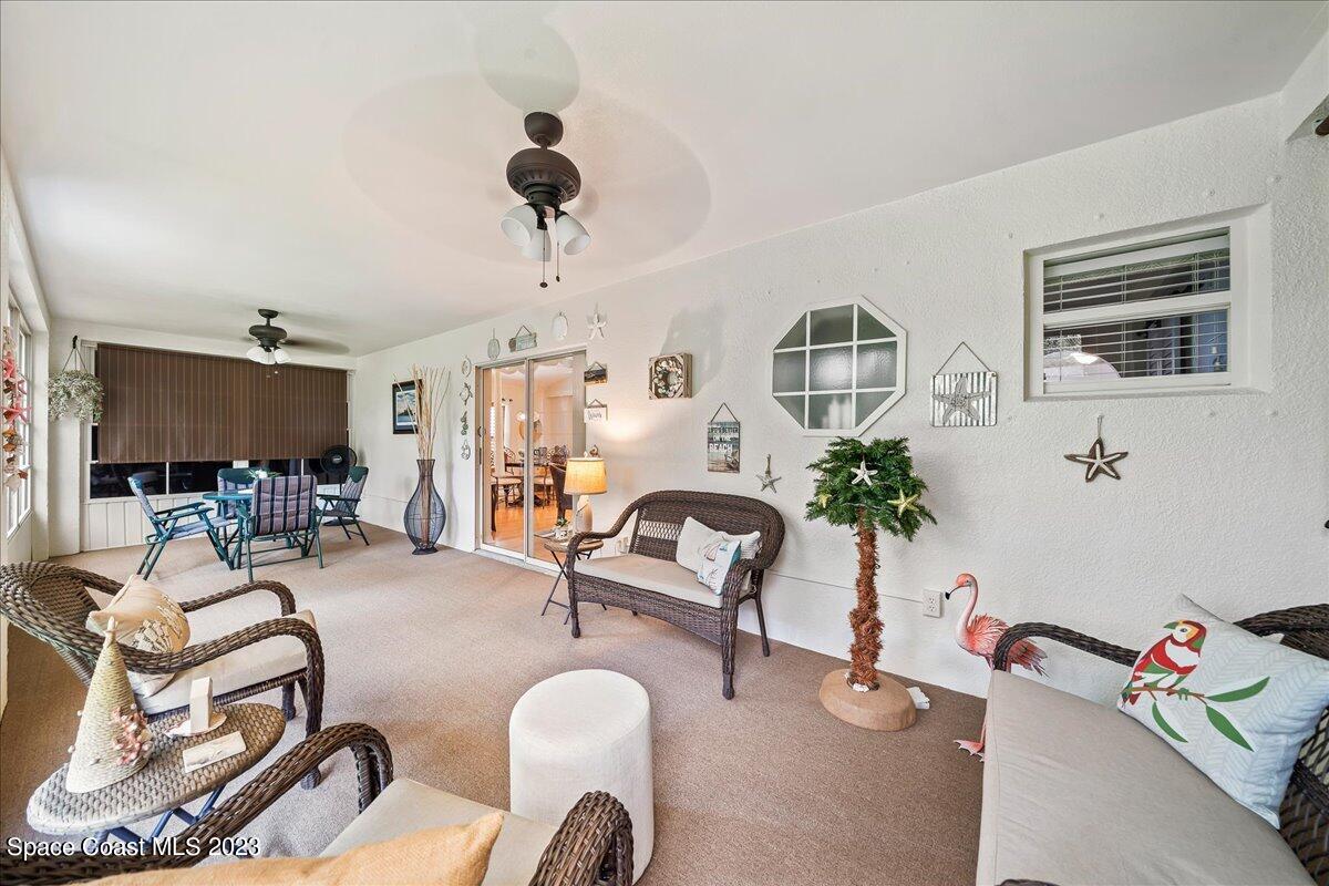 2190 Spring Creek Circle Palm Bay, FL 32905 - Photo 38 of 73 a living room with furniture