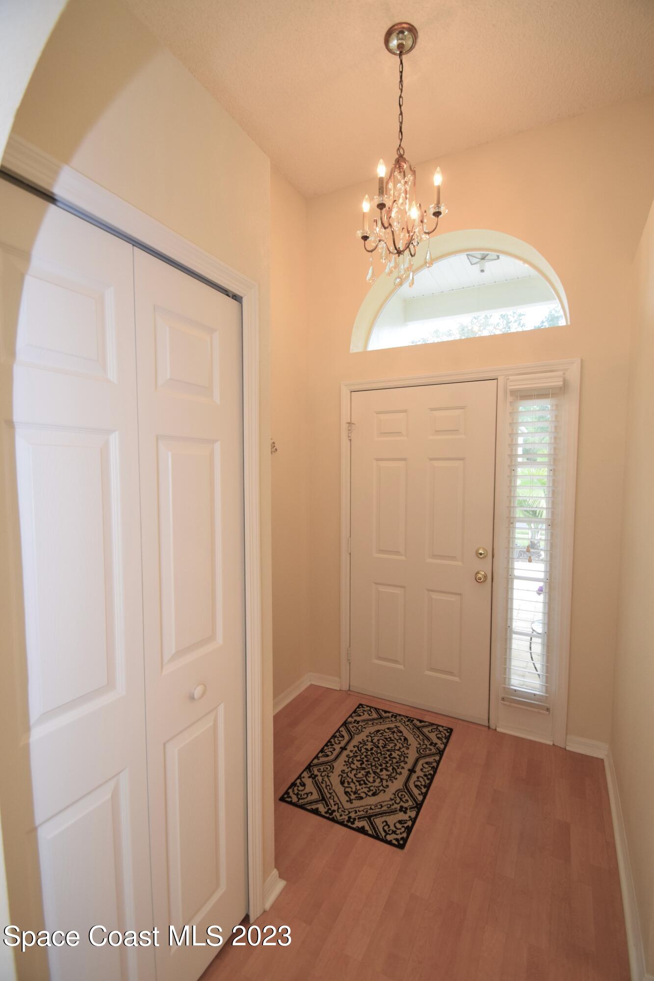 2190 Spring Creek Circle Palm Bay, FL 32905 - Photo 52 of 73 a bathroom with a sink and a mirror