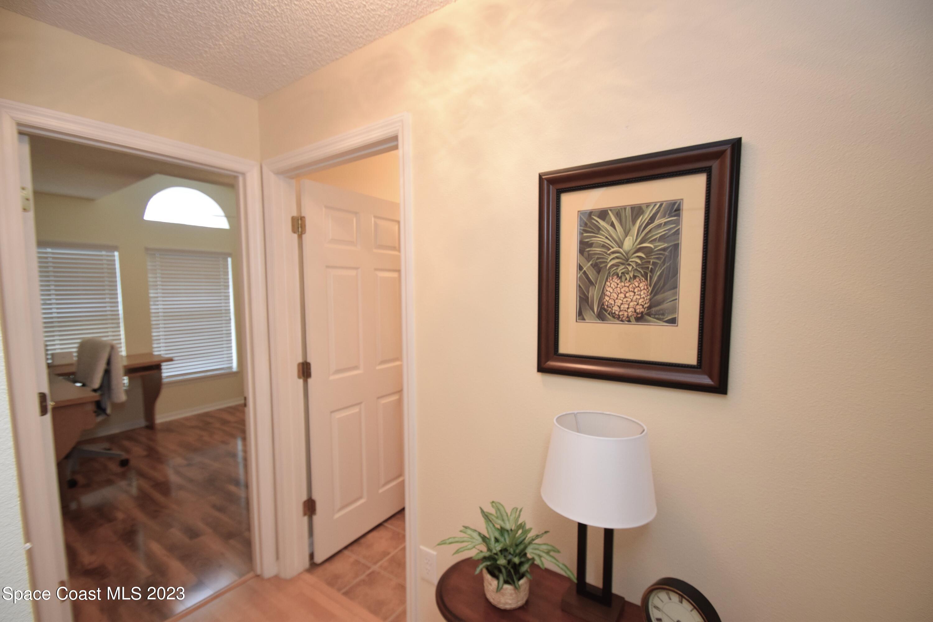 2190 Spring Creek Circle Palm Bay, FL 32905 - Photo 54 of 73 a view of a hallway with interior of the house