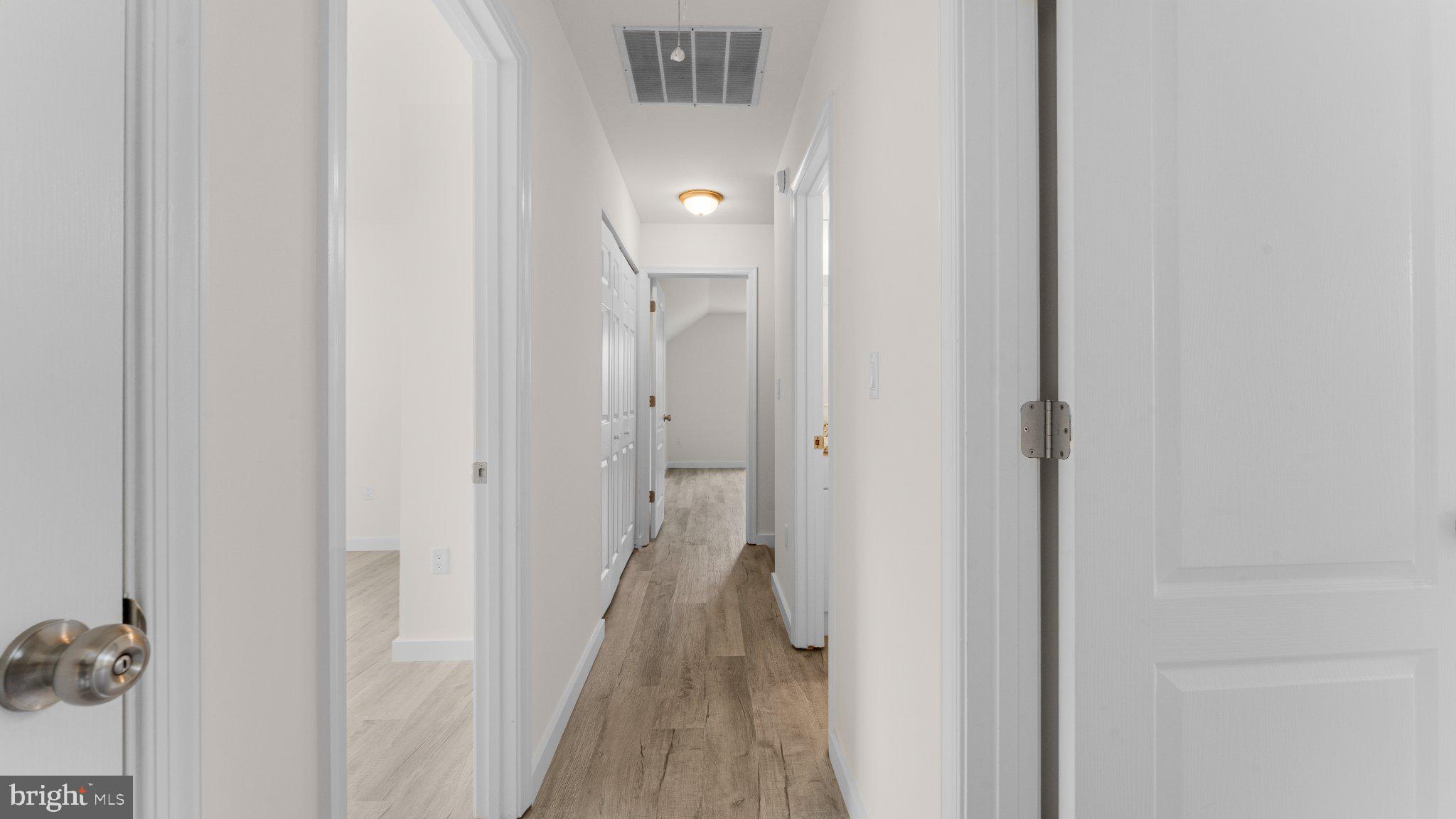 706 Carter Road Magnolia, DE 19962 - Photo 20 of 62 Bright and inviting hallway awaits you.