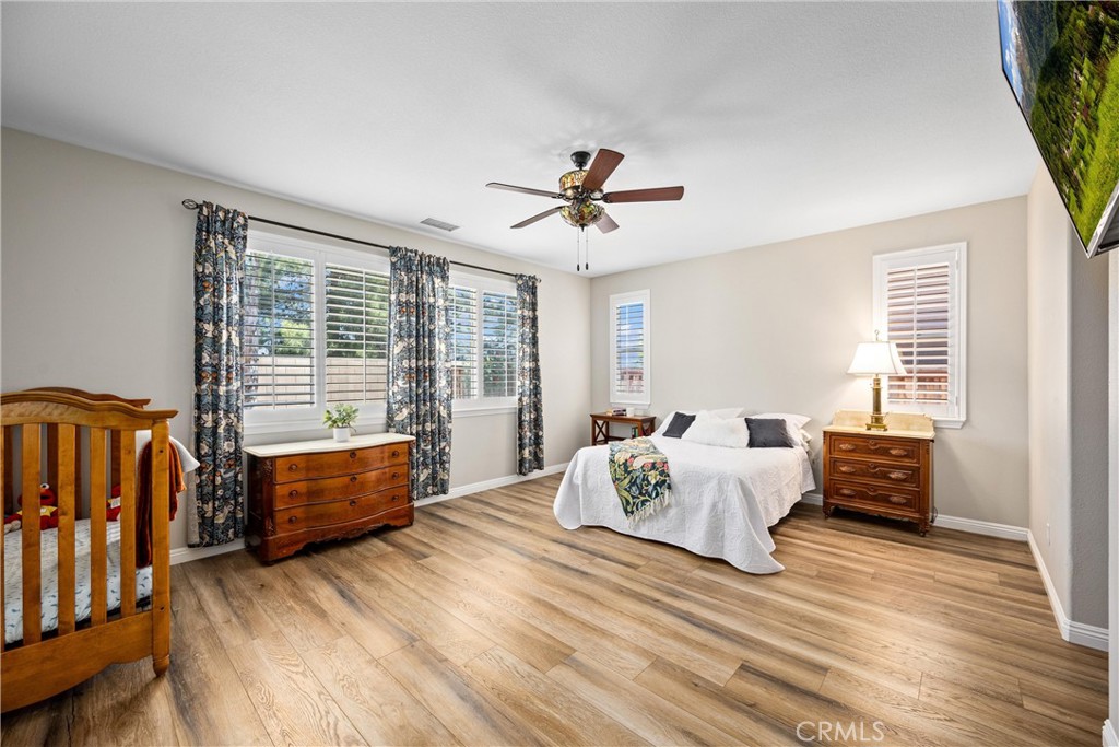 28264 Spring Creek Way Menifee, CA 92585 - Photo 19 of 35 Downstairs primary bedroom suite