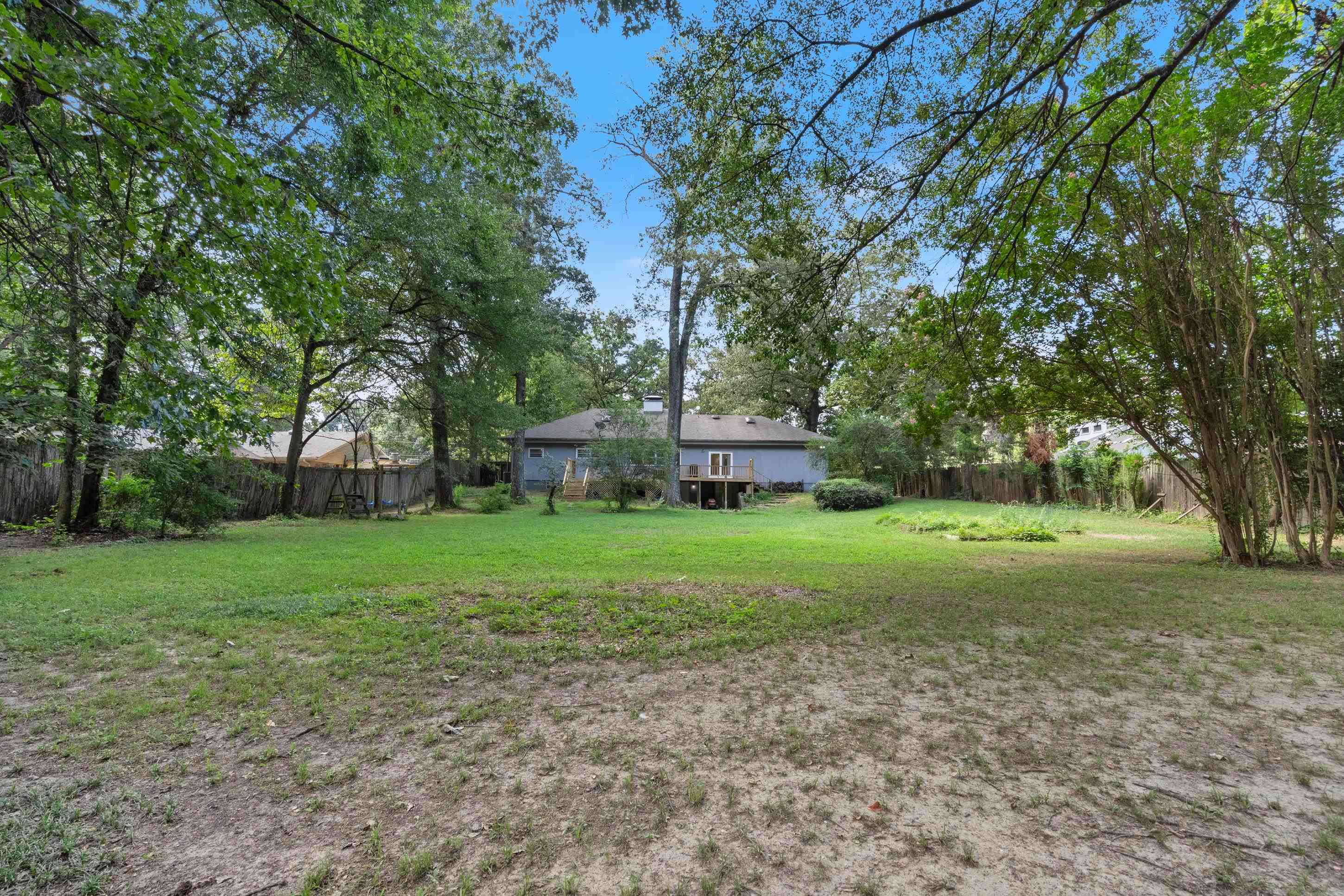 6164 Elmore Road Bartlett, TN 38134 - Photo 23 of 25 a view of outdoor space with deck and yard