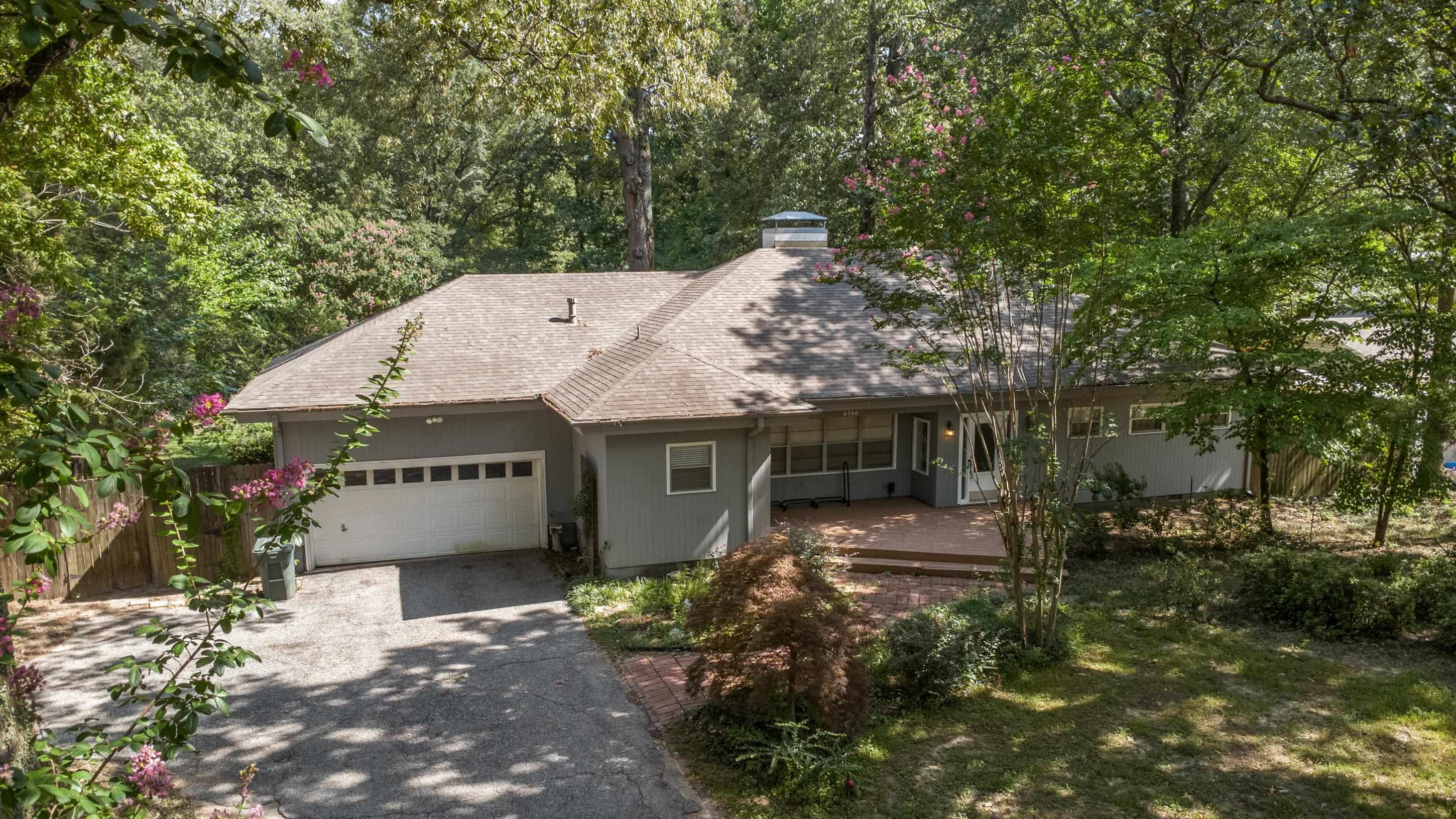 6164 Elmore Road Bartlett, TN 38134 - Photo 3 of 25 a view of a house with a yard and large tree