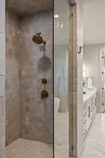 a kitchen with stainless steel appliances granite countertop a stove and a microwave