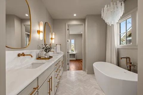 a kitchen with stainless steel appliances granite countertop a sink and cabinets