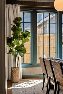 a en suite bathroom with a sink a toilet a shower and a mirror