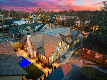 a view of living room with furniture and wooden floor