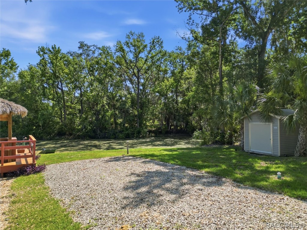 1471 North Lagoon Point Inverness, FL 34453 - Photo 53 of 68 Full Hook-up RV Site. Washer/Dryer Hookup in Storage Shed.